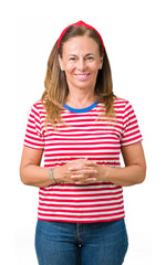 Beautiful middle age woman wearing casual stripes t-shirt over isolated background Hands together and fingers crossed smiling relaxed and cheerful. Success and optimistic