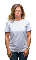 Obraz premium Middle age senior hispanic woman over isolated background depressed and worry for distress, crying angry and afraid. Sad expression.