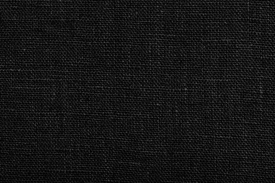 Black color fabric texture. Textile background copy space