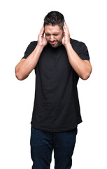 Fototapeta premium Young handsome man over isolated background with hand on head for pain in head because stress. Suffering migraine.