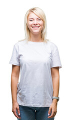 Fototapeta premium Young beautiful blonde woman wearing white t-shirt over isolated background with a happy and cool smile on face. Lucky person.