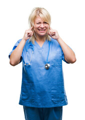 Young beautiful blonde doctor woman wearing medical uniform over isolated background covering ears...