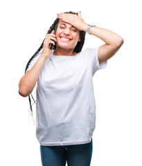 Young braided hair african american girl showing calling using smartphone over isolated background stressed with hand on head, shocked with shame and surprise face, angry and frustrated