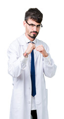 Young professional scientist man wearing white coat over isolated background Ready to fight with fist defense gesture, angry and upset face, afraid of problem