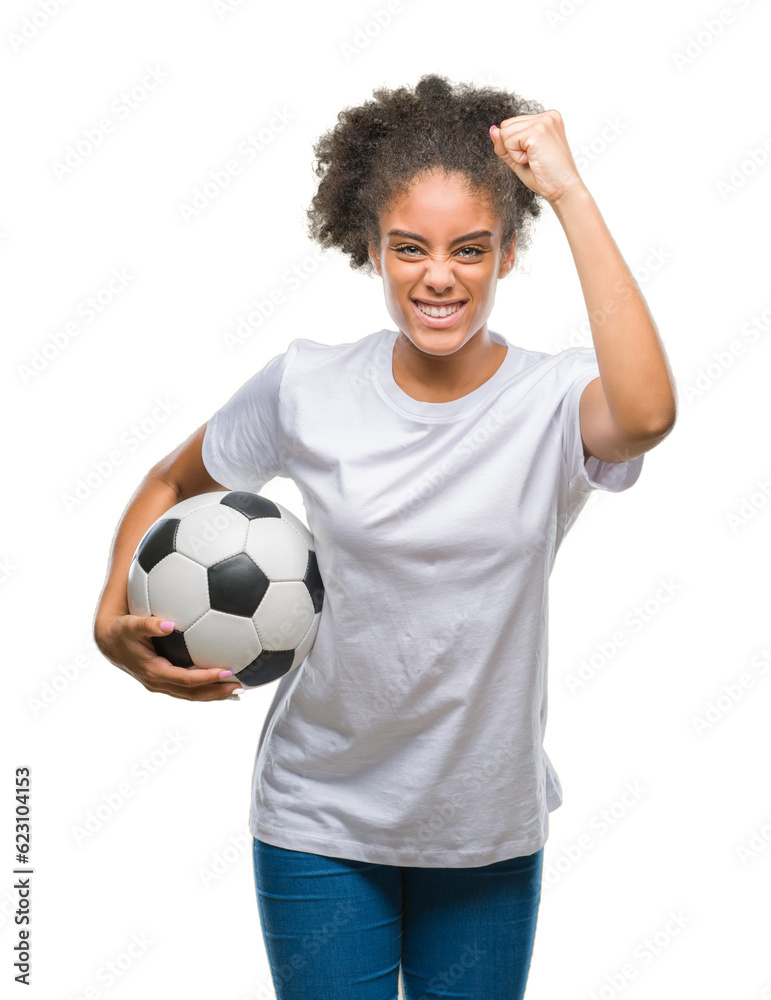 Canvas Prints Young beautiful afro american holding soccer football ball over isolated background annoyed and frustrated shouting with anger, crazy and yelling with raised hand, anger concept