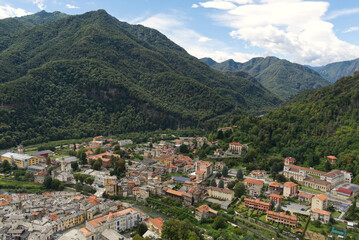 aerial shot of the Sesia river which crosses the city of varallo - obrazy, fototapety, plakaty