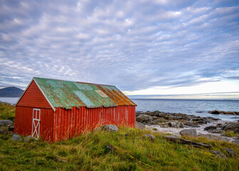 red hut on the beach
