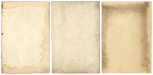 Fotobehang Vintage set / collection of three stained blank old book pages or sheets of vintage / antique paper, textured retro collage art backgrounds with ripped edges isolated over a transparent background, PNG  © Anja Kaiser