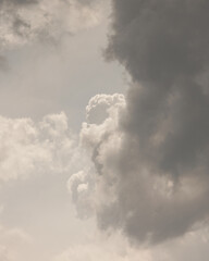 white storm clouds in sky background of nature. weather and climatic conditions, ecology. view of clouds from airplane window. Flight and freedom are religion. The top of sky and atmosphere, solar