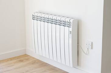 Electric panel radiator fitted with a house with no gas