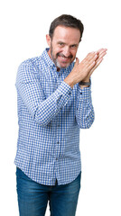 Handsome middle age elegant senior man over isolated background Clapping and applauding happy and joyful, smiling proud hands together