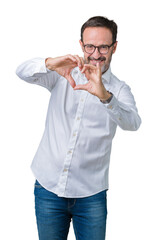 Fototapeta premium Handsome middle age elegant senior business man wearing glasses over isolated background smiling in love showing heart symbol and shape with hands. Romantic concept.