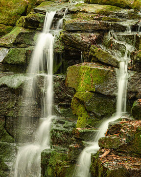 Close-up detail of Wharnley Burn Falls, a beautiful waterfall at Allensford near Consett, County Durham, the burn is a tributary of the River Derwent and well hidden in woodland