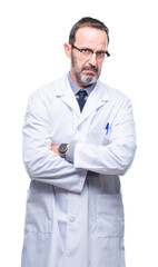 Middle age senior hoary professional man wearing white coat over isolated background skeptic and nervous, disapproving expression on face with crossed arms. Negative person.