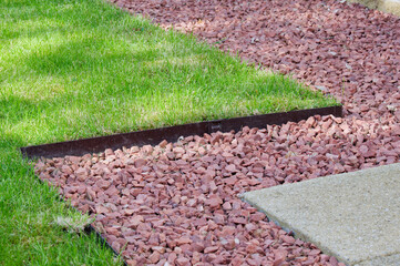 Lawn edging made of metal showing straight and neat finish