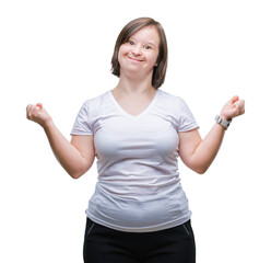 Young adult woman with down syndrome over isolated background celebrating mad and crazy for success...