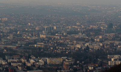 Cityscape of Banja Luka in smog, unhealthy air pollution in big cities