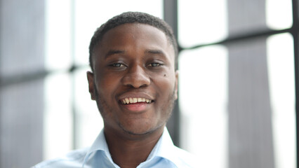 Portrait of successful young African American journalist with deep-in-thoughts face