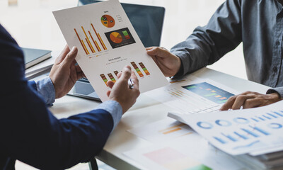 Business documents, Business people consulting meeting to discuss financial report analysis and...