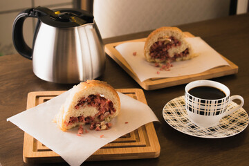 Breakfest tablet with coffee and bread with meal