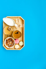 Two glasses of cold iced coffee with macaroons for summer breakfast