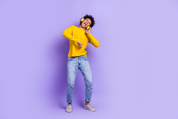 Fototapeta na wymiar Full body image active young man have fun listen wireless apple airpods pro brand loud bass music isolated on violet color background