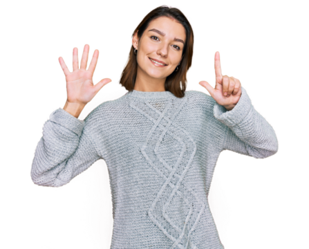 Young caucasian girl wearing casual clothes showing and pointing up with fingers number seven while smiling confident and happy.