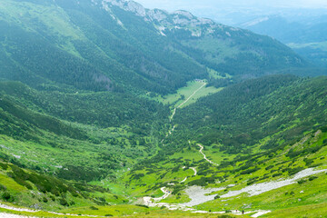 Fototapeta na wymiar Weekend in the mountains. Paths along the ridge