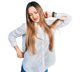 Beautiful caucasian woman wearing casual white shirt stretching back, tired and relaxed, sleepy and yawning for early morning