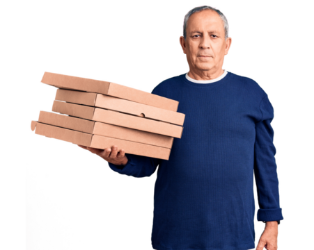 Senior handsome man holding pizza boxes thinking attitude and sober expression looking self confident