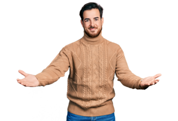 Young hispanic man wearing casual clothes looking at the camera smiling with open arms for hug. cheerful expression embracing happiness.