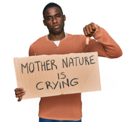 Young african american man holding mother nature is crying protest cardboard banner with angry face, negative sign showing dislike with thumbs down, rejection concept