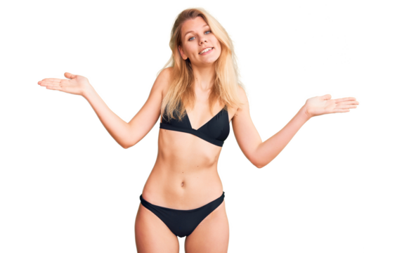 Young beautiful blonde woman wearing bikini smiling showing both hands open palms, presenting and advertising comparison and balance