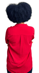 Young african american girl wearing casual clothes standing backwards looking away with crossed arms