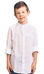 Cute blond kid wearing elegant shirt with a happy and cool smile on face. lucky person.