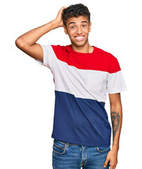 Young handsome african american man wearing casual clothes confuse and wonder about question....