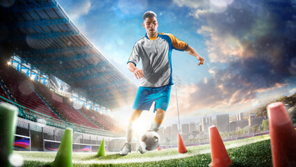 Fototapeta na wymiar professional soccer player workout on the grand field.