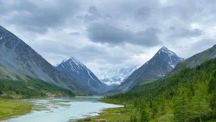 Picturesque view of the stunning peaks of Altai. Hike to the foot of Belukha. Beautiful Akkem lake. Picturesque view of the stunning peaks of Altai. Hike to the foot of Belukha. Beautiful Akkem lake.