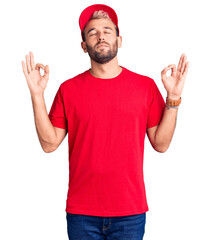 Young handsome blond man wearing t-shirt and cap relax and smiling with eyes closed doing meditation gesture with fingers. yoga concept.