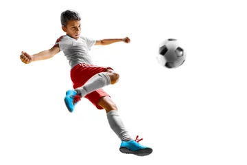 Zelfklevend Fotobehang children soccer player in action isolated white background © 103tnn