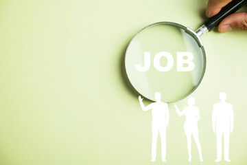 Innovative job search concept depicted by a magnifying glass highlighting JOB text, emphasizing use...