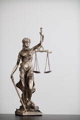 statue of god Themis Lady Justice is used as symbol of justice within law firm to demonstrate truthfulness of  facts and power to judge without prejudice. Themis Lady Justice is of justice.