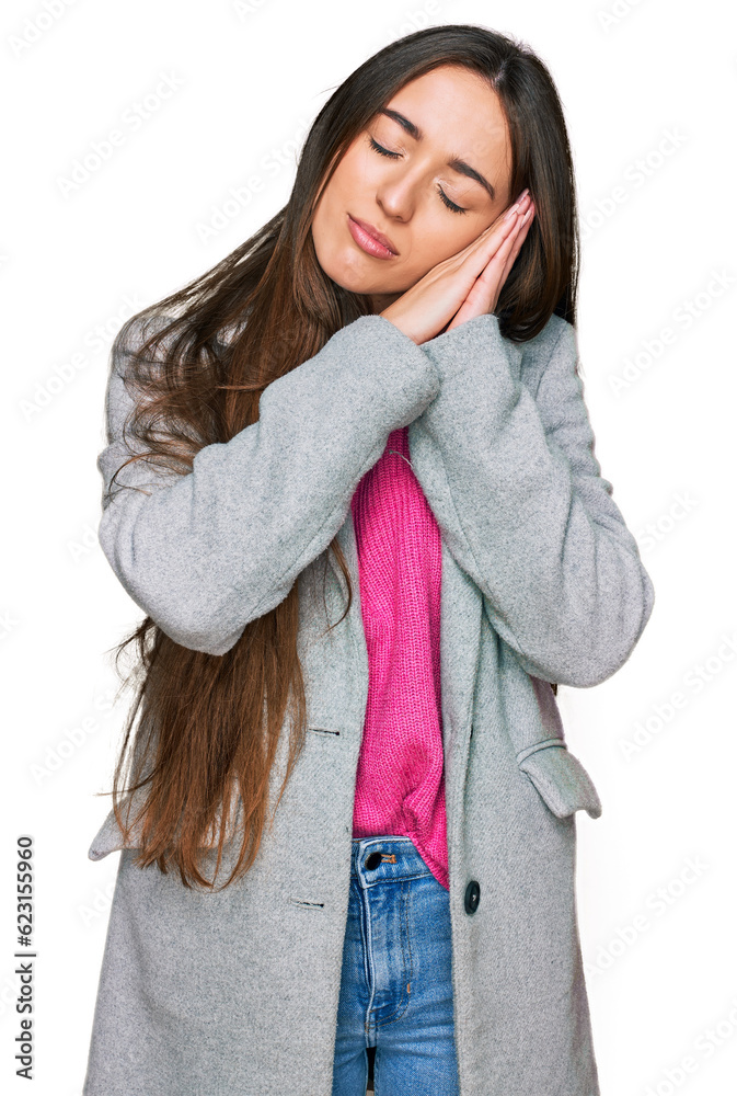 Canvas Prints Young hispanic girl wearing business clothes sleeping tired dreaming and posing with hands together while smiling with closed eyes.