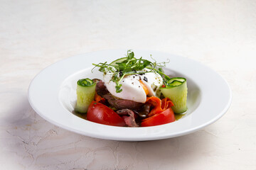 Salad with tomato and egg plows.