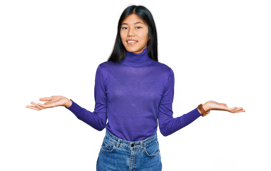 Beautiful young asian woman wearing casual clothes smiling showing both hands open palms, presenting and advertising comparison and balance
