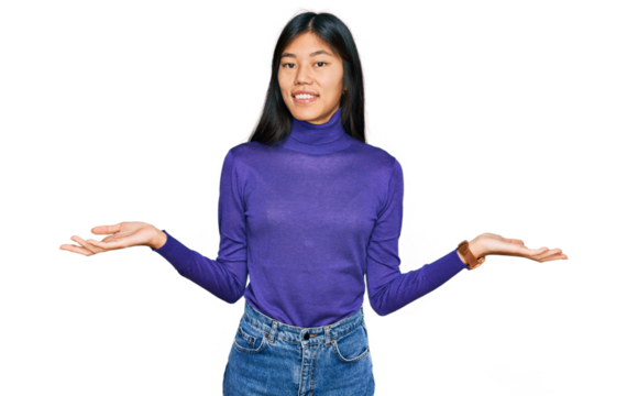 Beautiful young asian woman wearing casual clothes smiling showing both hands open palms, presenting and advertising comparison and balance