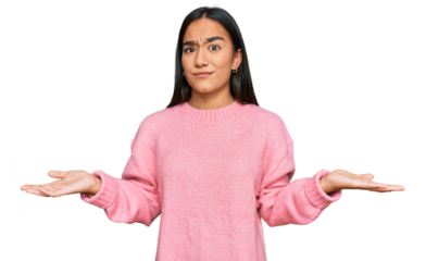 Young asian woman wearing casual winter sweater clueless and confused with open arms, no idea concept.
