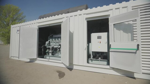 Container Mobile Intelligent Diesel Generator Energy Storage Power Station. Diesel Power Modules. Diesel industrial power generator generator. Exterior of a large industrial generator. 