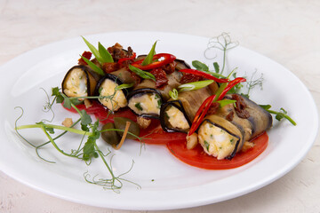 Eggplant rolls stuffed with cheese.