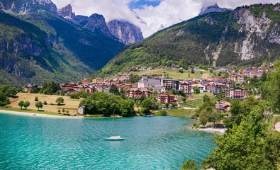 Poster Most scenic mountain lakes in northern Italy - beautiful Molveno in Trento, Trentino Alto Adige region. surounded by Dolomites mountains © Freesurf